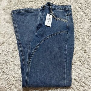 Rhinestone tassel jeans from Cider